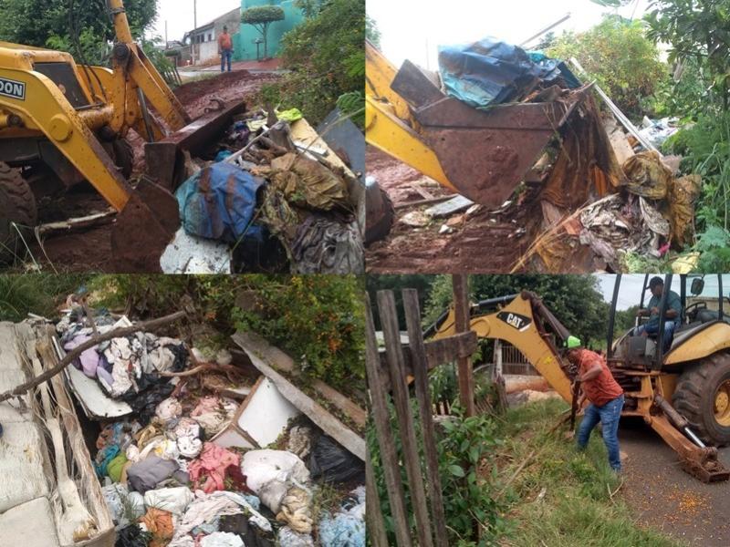 DENGUE - Dois caminhões de lixo foram retirados de uma residência do Conjunto Águas Claras